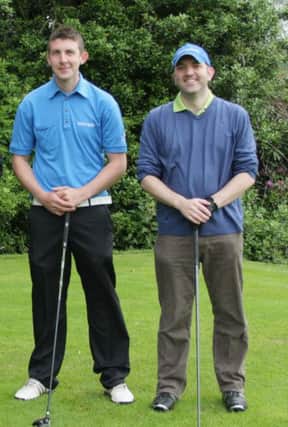 The latest competition winner at Lambeg GC, Kirk Thornhill (left) along with Aidan Daly.