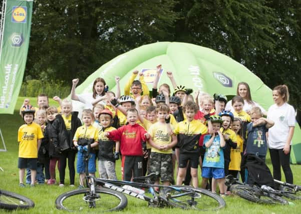 Gavin Hanna, Caitlin Hanna, Debbie Boyd, Robbie Smyth, Joel Bingham and Dylan Lyness from the Apollo Rockets Youth Cycling group are pictured with Natasha McCartan and Aisling Fitzpatrick from the Lidl Community Crew.