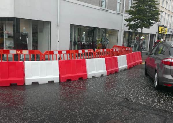 The barriers which have been placed at the corner of Wellington Street/Ballymoney Street to facilitate the ongoing town centre Publc Realm Scheme. (Editorial Image).