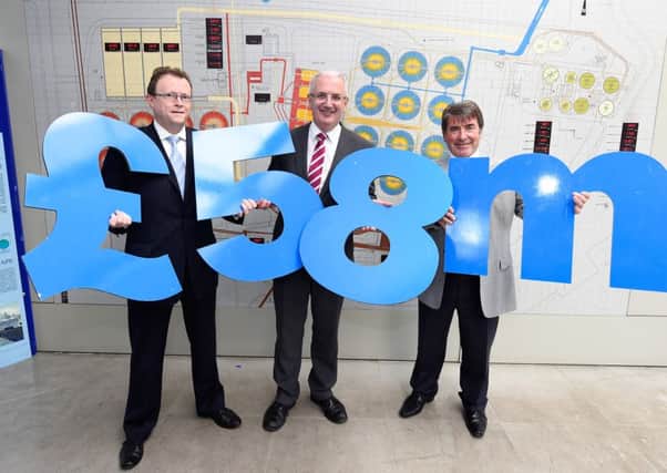 Pictured with Regional Development Minister, Danny Kennedy are Ronan Larkin (left) , Director of Finance and Regulation at NI Water and Michael Loughran, Managing Director of GO Power (right) at Belfast Wastewater Treatment Works. Picture: Michael Cooper