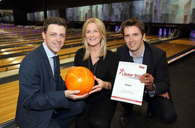 Aoife Loughran, operations manager at Lisburn Bowl, the new 10-pin bowling alley, with Rikki Thompson, advertising executive with the Ulster Star, and Alistair Bushe, regional editor, announcing Lisburn Bowl's sponsorship of the volunteer section of the Ulster Star's People of the Year Awards.  US1534-526cd  Picture: Cliff Donaldson