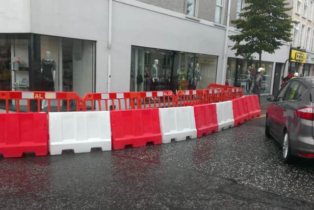 The barriers which have been placed at the corner of Wellington Street/Ballymoney Street to facilitate the ongoing town centre Publc Realm Scheme. (Editorial Image).