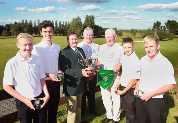 Irish Junior Foursomes  Final at The Heath Co Laois, GUI President Elect Kevin McIntyre presents the trophy to the winners ,Lisburn Golf Club, Aaron Marshall,Mark McNelis,Mark Jameson Team Captain,John Boyd Captain Lisburn golf club, Josh Robinson, and Christian Kennedy. pic Ronan Lang