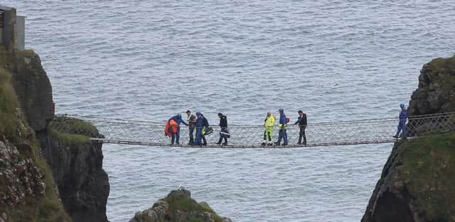 A casualty has been walked from Carrick a Rede Island acoss the rope bridge after falling on the Island. PICTURE KEVIN MCAULEY/MCAULEY MULTIMEDIA
