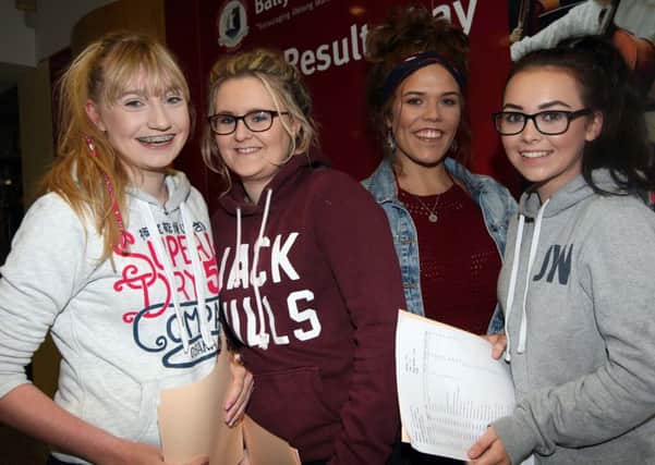 Amber Northcott, Kennedy Starrs, Aimee Ashton and Katy Gilfedder celebrate their excellent GCSE results at Ballyclare High. INNT 35-801CON