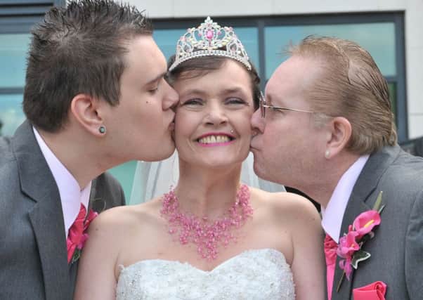 Scott Vineer with his mum Helen-Louise and husband Paul Doney