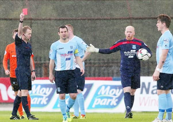 Ballymena United skipper Jim Ervin leaves the pitch after being sent off in the opening minute of tonight's Danske Bank Premiership game against Carrick Rangers. Picture: Press Eye.