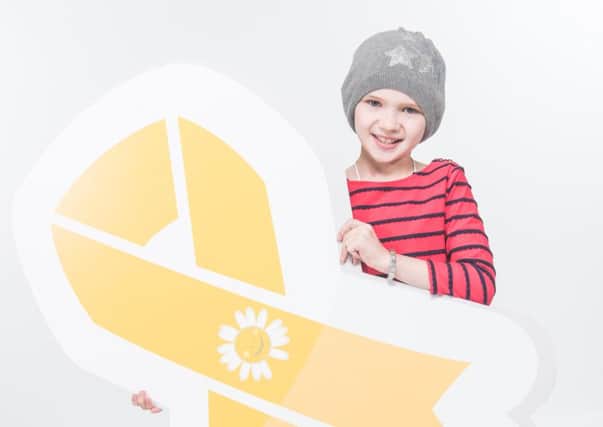 Ahoghill girl Molly Taylor and her family are helping Cancer Fund for Children launch its participation in Childhood Cancer Awareness Month this September. (Submitted Picture).