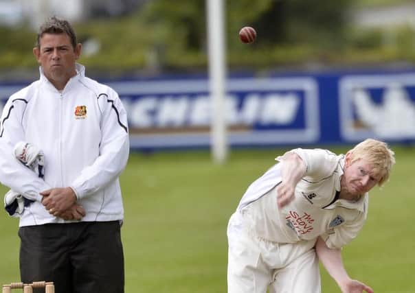 Carrick's Anthony Martin bowling against Ballymena. Photo: Press Eye