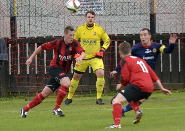 Keeper Stephen Croft has his eye on Stephen Greene in a recent Town match ©Edward Byrne Photography INBL1534-262EB