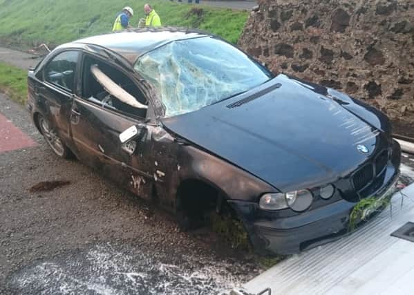 The black BMW which crashed on the A8 Ballymena Road in Larne.  INLT 36-683-CON