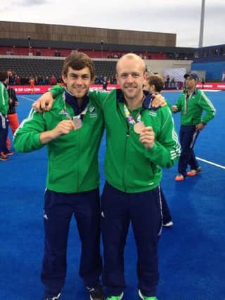 Banbridge Hockey Club's Matthew Bell and Eugene Magee show off their bronze medals.
