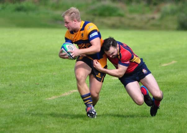 Bangor's Mark Widdowson on his way to scoring against Ballyclare at The Cloughan. INLT 36-928-CON