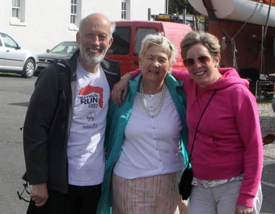 Justice Minister David Forde with his wife and Mary Wallace  at the Rathlin Island run. inbm36-15 kma