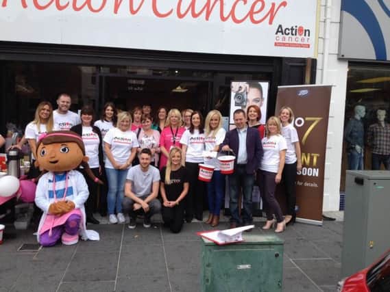 The Boots team pictured at last year's event at the Action Cancer store in Lurgan.