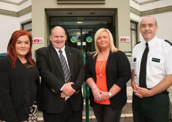 Mid and East Antrim Borough Council Chief Executive Anne Donaghy, Alderman Greg McKeen, Chairman of the Policing and Community Safety Partnership, Vice Chair Wendy Kerr, and PSNI Superintendent Ryan Henderson.  INCT 35-729-CON