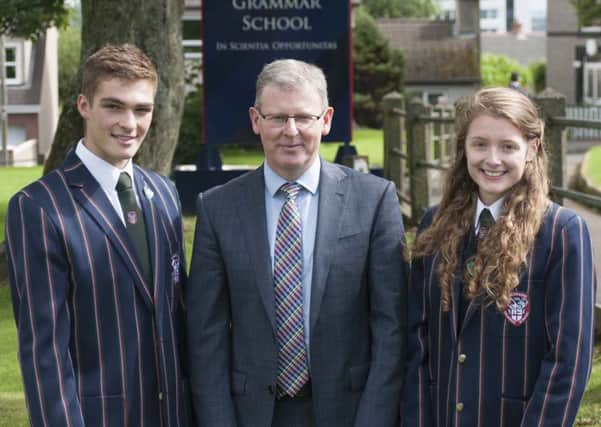 Coleraine Grammar School has announced Conor Skuce as Head Boy and Emily McConaghie as Head Girl. The two Year 14 pupils are pictured with Dr David Carruthers, headmaster,