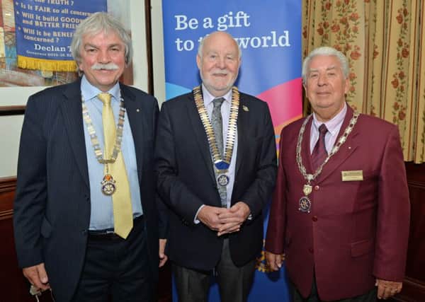 Declan Tyner (centre), Rotary District Governor of all Ireland, with Leonard Sproule (left), Rotary Club of Newtownabbey President, and Clifford Arnold, President of the Rotary Club of Belfast Fortwilliam. INNT 35-012-PSB