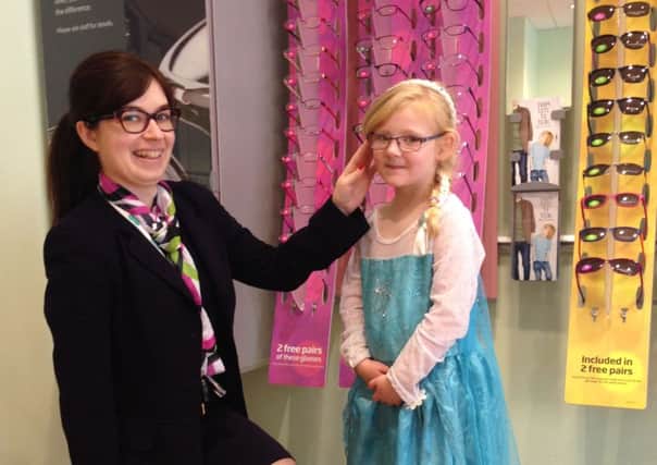 Little Kaci Middleton with Sinead Kelly, supervisor in the Diamond store.