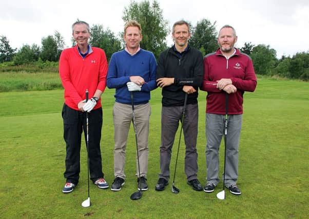 Mark Hamilton, Brian Hagarty, Paul Sittlington and John Smith on the first tee at Galgorm Castle Golf Club for the Music Rooms-sponsored comeptition. INBT 36-803H