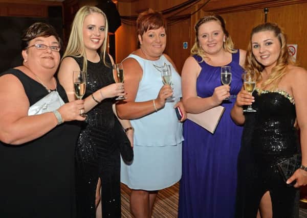 Alana McMaw, Lauren McCausland, Jacqueline Lyness, Ashleigh Lyness and Leah Martin enjoying the 1 in 3 Cancer Support Group gala evening. INCT 36-015-PSB