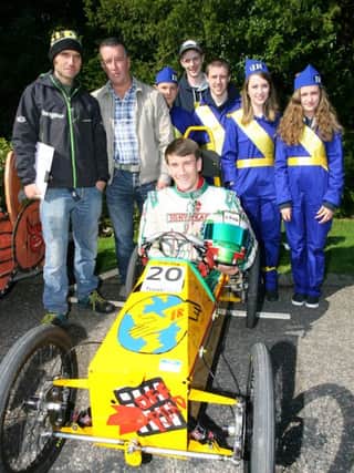 Edengrove youth club are announced as the Overall Winner earning the prize of a 12-seater minibus worth over £25,000, from world record holder and racing legend Guy Martin after cruising home to victory at the inaugural TrustFord Soap Box Derby at this years Hillsborough International Oyster Festival