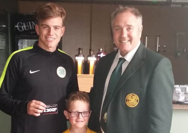Daniel Wilson picked up the McLean's-sponsored 'man-of-the-match' award from Lurgan Celtic manager Colin Malone following his impressive debut. Also included is Daegan Magee from the club's under eights.INLM37-150