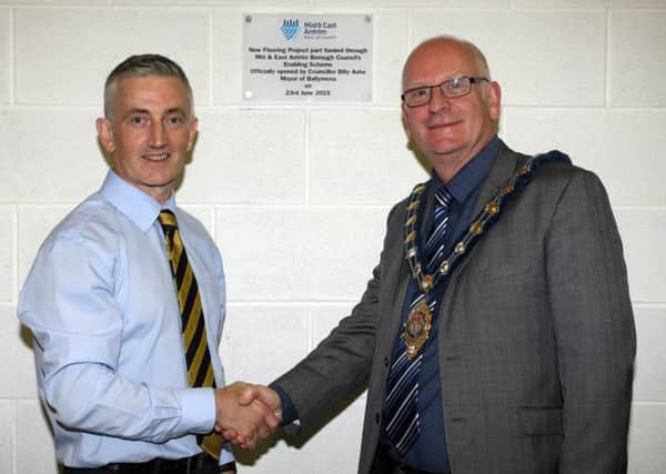 David Toney, of The Dojo, pictured with Mayor of Mid and East Antrim Council, Cllr. Billy Ashe, who officially opened their premises at Woodside Industrial Estate. INBT27-219AC