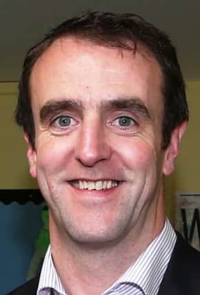 Minister for the Environment Mark H Durkan.