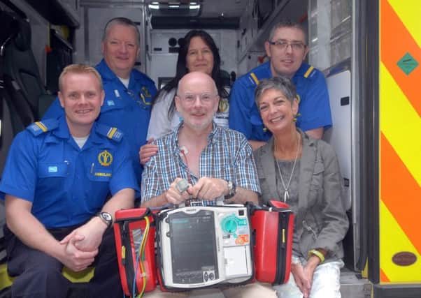 James Hudson with his wife Jane along with medical team members, front left, Mark Anderson, Raymond Lappin, Dee Baker and David Gribbons. INBL3815-CAH1