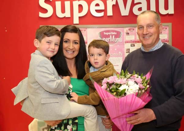 Lisa Hamilton has been announced as SuperValu Banbridges finalist in the 2015 SuperValu SuperMums campaign. Lisa is pictured with Jamie and Callum and SuperValu Banbridge store manager Michael McCarten.