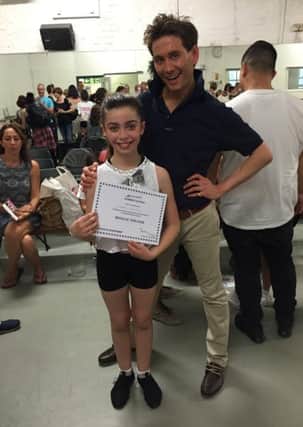Abby Smyth, pictured with Ryan Jenkins, who taught her at the world famous Pineapple Dance Studios in London.
Ryan has previously taught Maddie Zeigler, and is a close friend of Abby Lee Millar. He taught Abby a dance routine from the hit musical, Wicked.