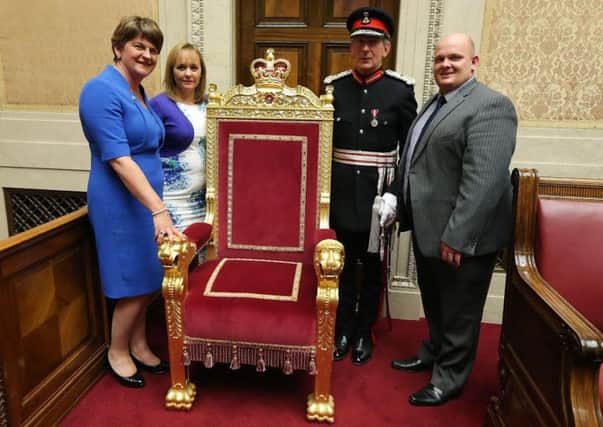 DUP representatives with the Queen's throne in Northern Ireland. Kelvin Boyes, Press Eye