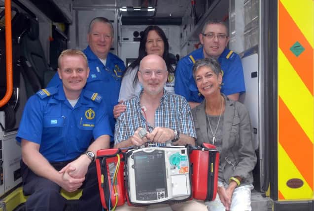 James Hudson with his wife Jane along with medical team members, front left, Mark Anderson, Raymond Lappin, Dee Baker and David Gribbons. INBL3815-CAH1