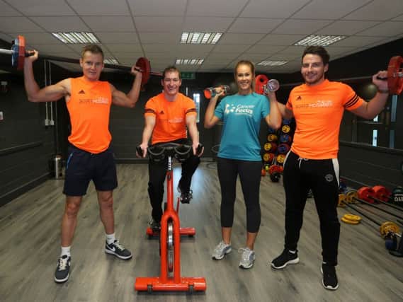 Suzie Colledge of Cancer Focus joined Chris, David and Geoff from Scott McGarry Health & Fitness at last week's launch of the Focus Fit Challenge, six week fitness programme where volunteers raise funds for Cancer Focus during a six week programme. The event, which start at Scott McGarry Health & Fitness on October 19th, raised £8500 last year. INBT 38-103JC