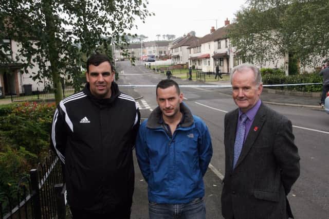 Cllr. Stewart McDonald, Cllr. Timothy Gaston and Cllr. Billy Henry at the scene in Ahoghill on Thursday morning. INBT39-206AC