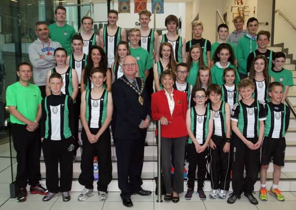 Mayor of Mid and East Antrim Council, Cllr. Billy Ashe, is pictured hosting a reception for member of Ballymena and Antrim Athletics Club. INBT37-221AC