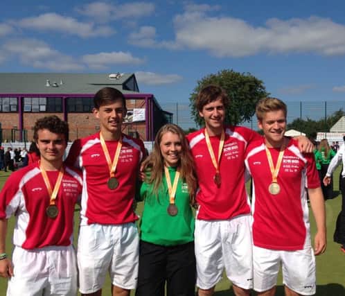 The five Wallace High School hockey players who won medals at the UK School Games held recently in Manchester. The four boys won gold medals, whilst Jane Kilpatrick won a bronze.