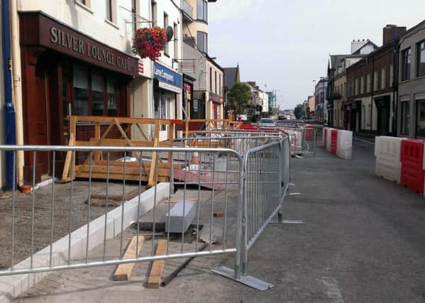 The entrances to local businesses during public realm work in Larne. INLT-38-702-con
