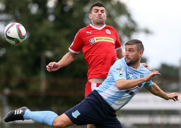 Ballymena's Matthew Tipton and Cliftonville's Johnny Flynn in action during today's Danske Bank Premiership game at the Showgrounds. Picture: Press Eye.