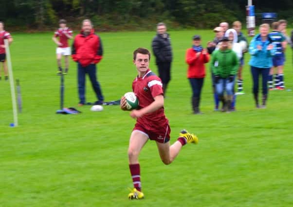 Dalriada First XV Captain Captain Angus Johnston scoring an intercept try from his own half.