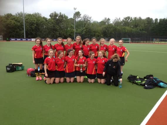 The Banbridge Academy girls with their first trophy of the season.