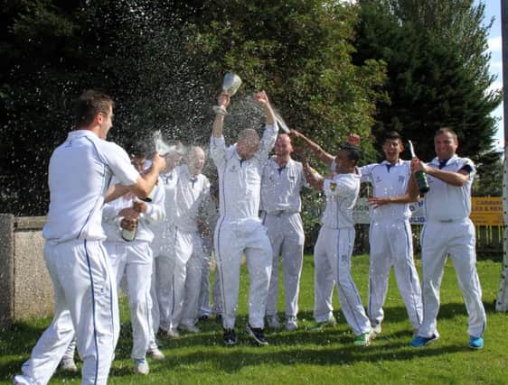 Champagne celebration for Coleraine. Picture by Barry Chambers / Press Eye.