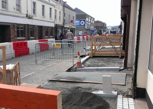 Traders say that public realm work at upper Main Street has caused disruption to their businesses. INLT-38-703-con