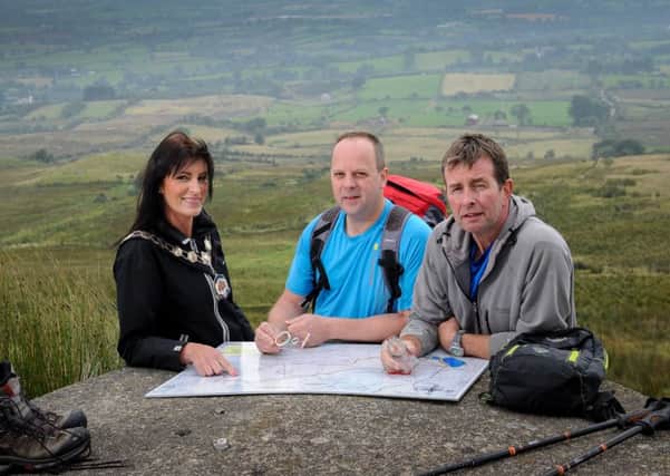 Chair of Mid Ulster District Council, Councillor Linda Dillon, hillwalking in the Sperrins with the Chairman of Mid Ulster Walking Club, George Hammill, and Paul Connelly, also a member of the walking club.