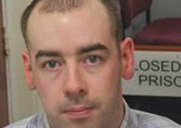 John Patrick Smyth who is unlawfully at large from Magilligan Prison
