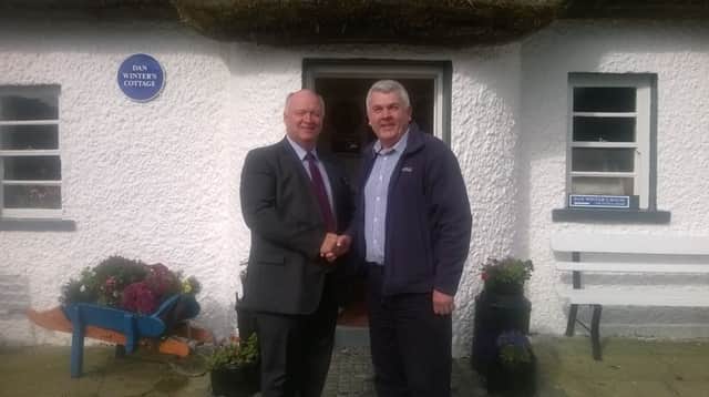 Wor Bro David Simpson MP welcomes Rt Wor Bro Alan McLean IGM to Dan Winter's Cottage during a visit by ILOI to Boyne Site and Dan Winter's Cottage to mark the 325th anniversary of The Battle of the Boyne. INBM39-15 S