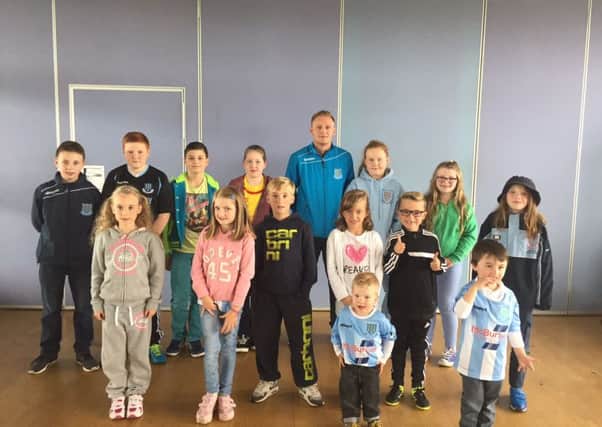 Some of the Junior Sky Blues at their first meeting of the season with special guest Stephen McBride.