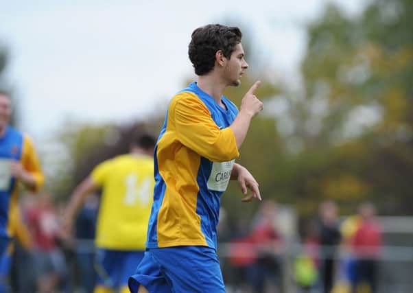 Nortel's Adam Richmond celebrates after scoring to put his side 4-2 up. INLT 39-910-CON Photo: Philip McCloy