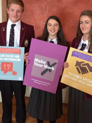 Carrick Grammar School pupils Sophie Bell, Erin McAllister and Sam Brodison attended the launch of the Youth Parliament's 'Make your Mark' consultation exercise in Stormont. INCT 38-708-CON